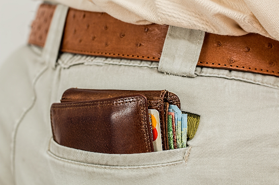 One of the first travel safety tips for long-term travelers I learned was as an exchange student in the Philippines in 1980: Keep your wallet as inconspicuously as possible in the front pocket of your pants.:By putting his wallet in such a conspicuous place, this man almost invites a pickpocket to steal his wallet. I think this precaution, and my imposing frame, have kept pickpockets mostly at bay. (I was once pickpocketed on a bus in Milan, though).